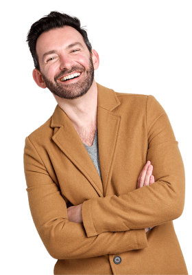 happy-man-with-beard-smiling-against-gray-wall-2021-08-28-01-03-55-utc.png